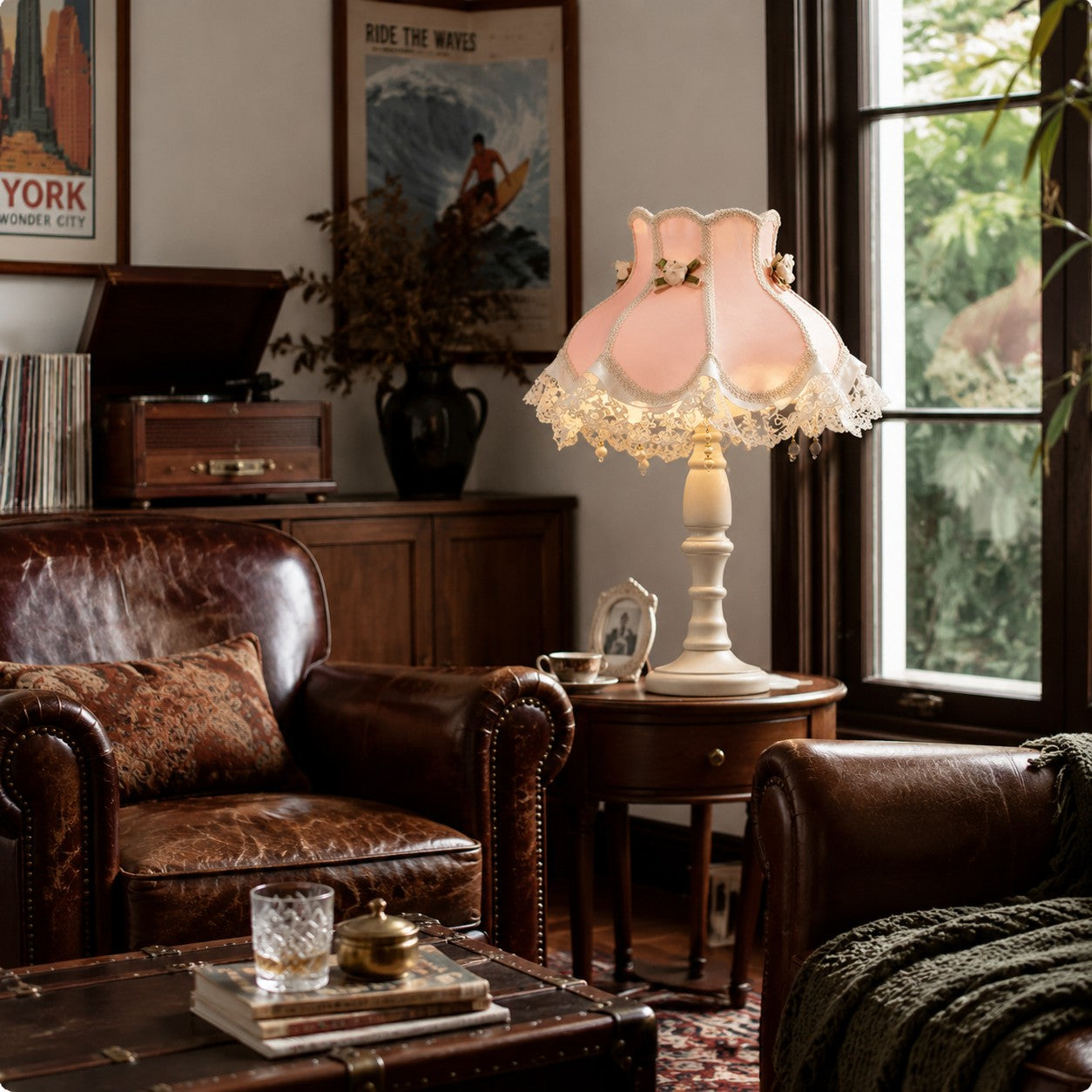 Pink lace table lamp beside a leather chair
