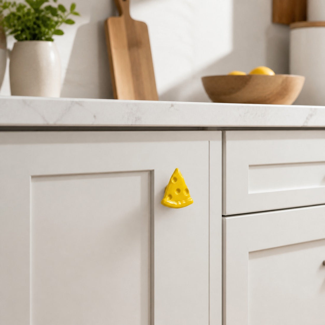 Cheese slice cabinet knobs on modern furniture