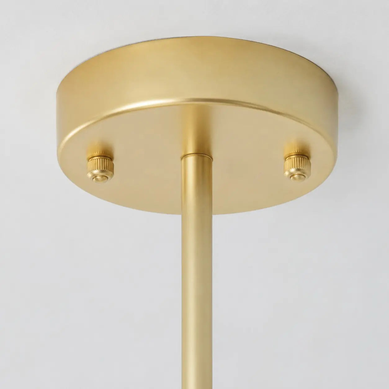 Gold ceiling canopy and downrod detail