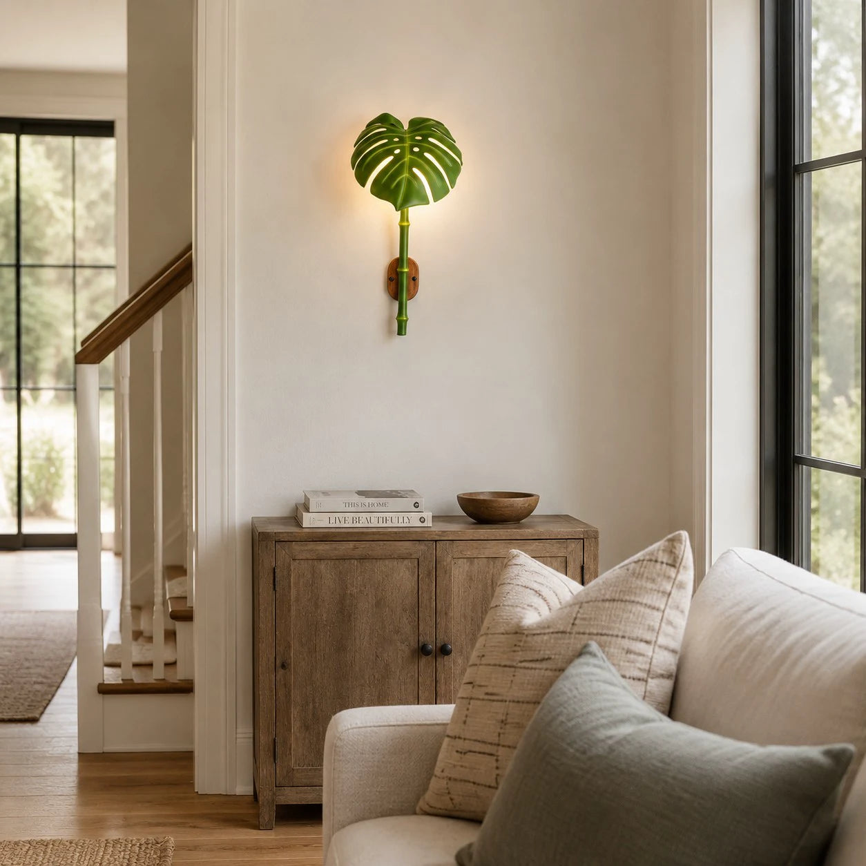 Decorative leaf wall sconce in a garden setting