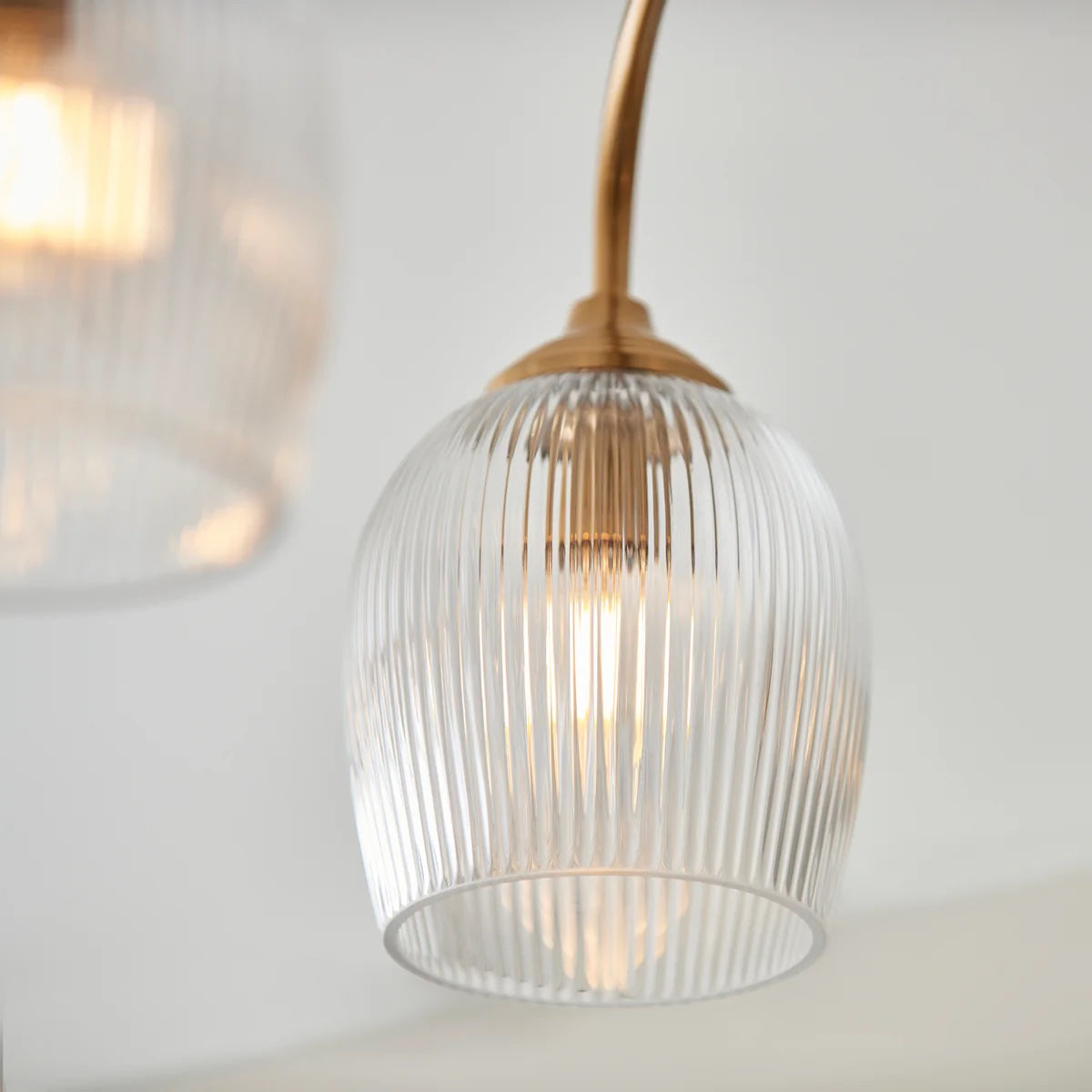 Brazara Multi-Light Glass Shade Pendant Lamp – Curved Metal Arms for Modern Homes