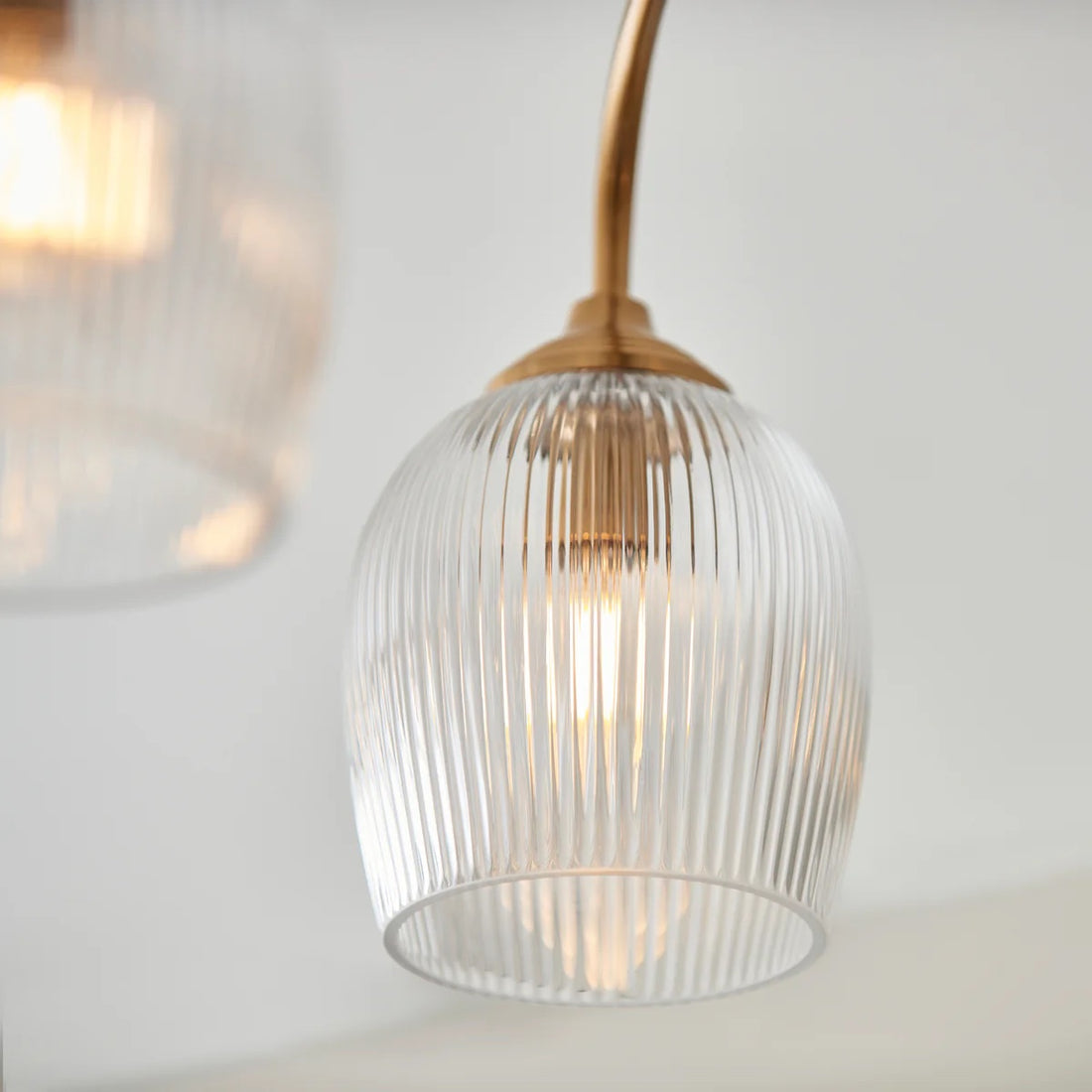 Brazara Multi-Light Glass Shade Pendant Lamp – Curved Metal Arms for Modern Homes