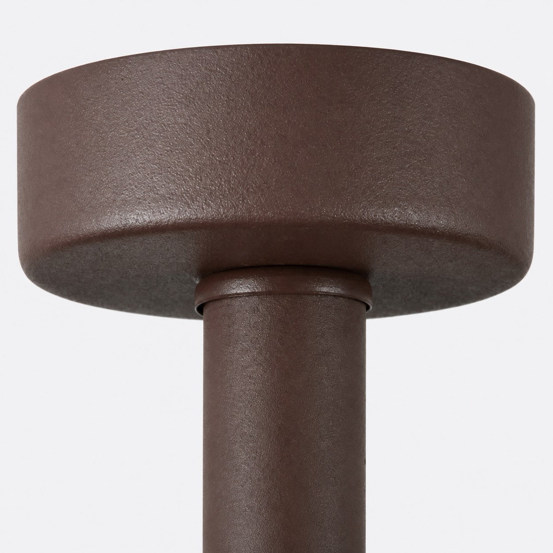 Close-up of coffee finish metal canopy