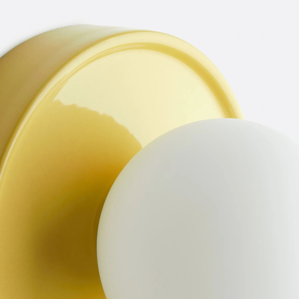Solna Round Glass Wall Sconce with Ceramic Base—Minimalist Lighting for Bedroom or Hallway
