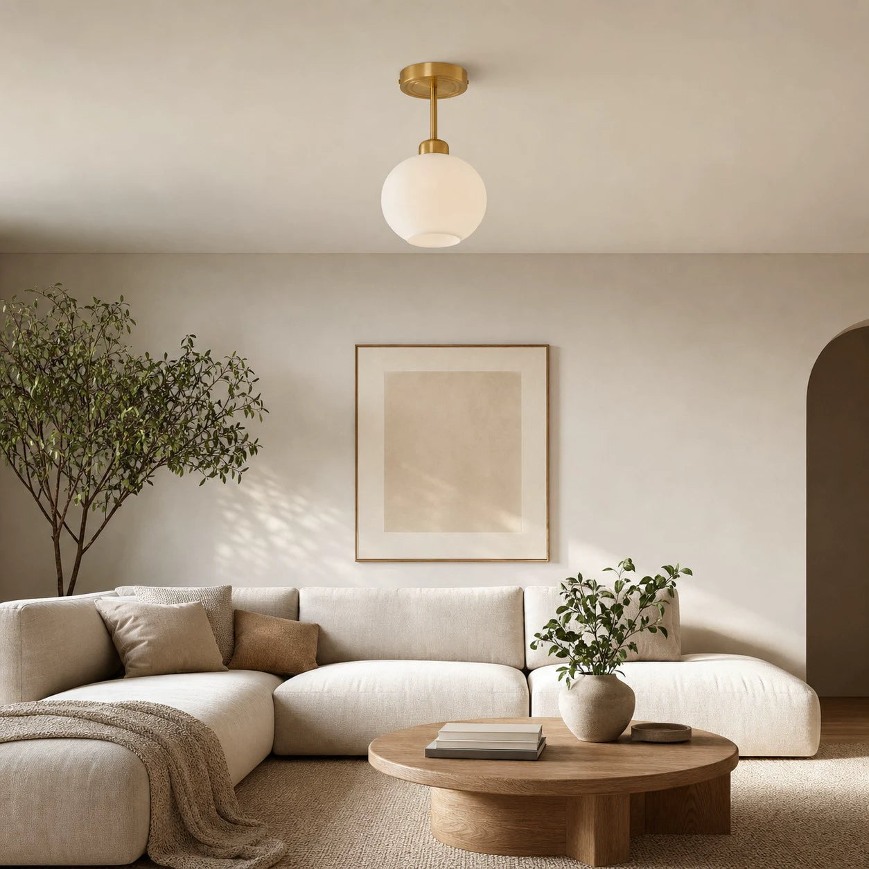 Extended rod ceiling light in a warm neutral living room