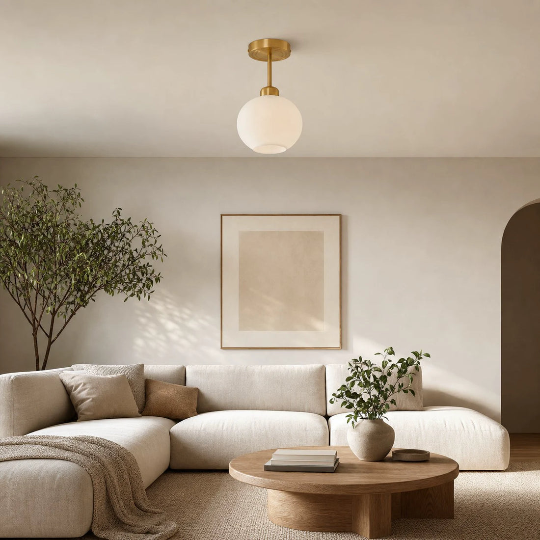 Extended rod ceiling light in a warm neutral living room