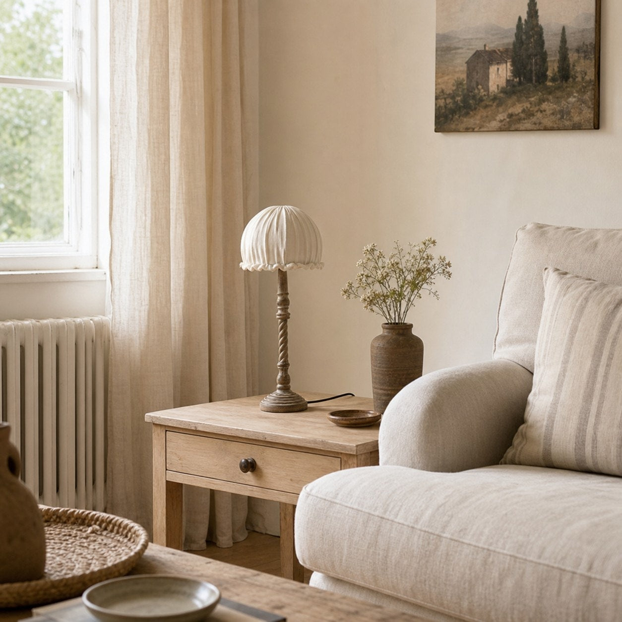 Pleated shade table lamp beside sofa