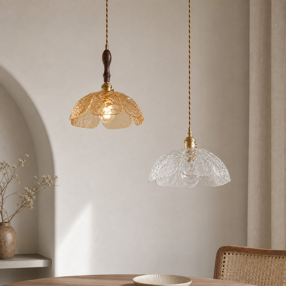 Amber walnut and clear brass pendants shown together
