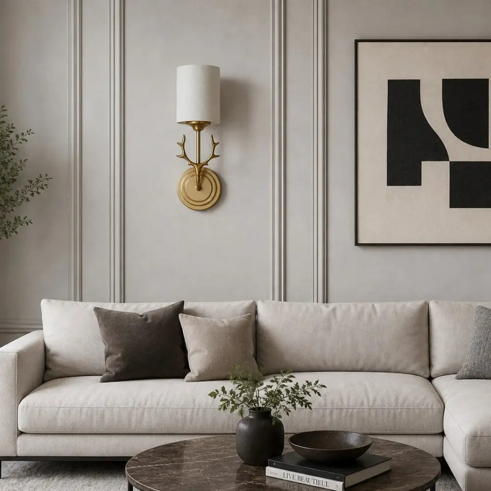 Decorative antler wall light in a styled room