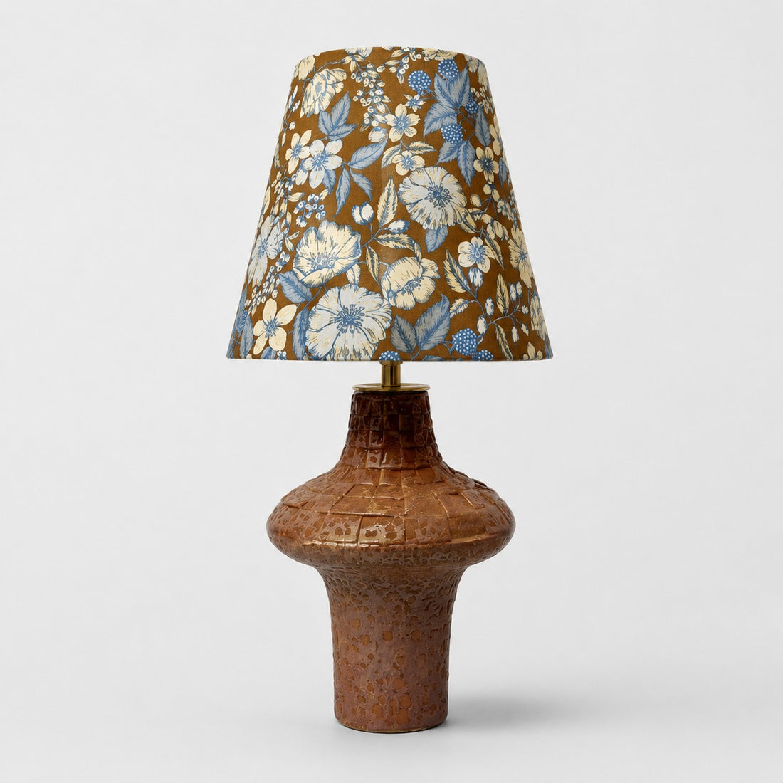 Vintage ceramic table lamp with blue floral fabric shade