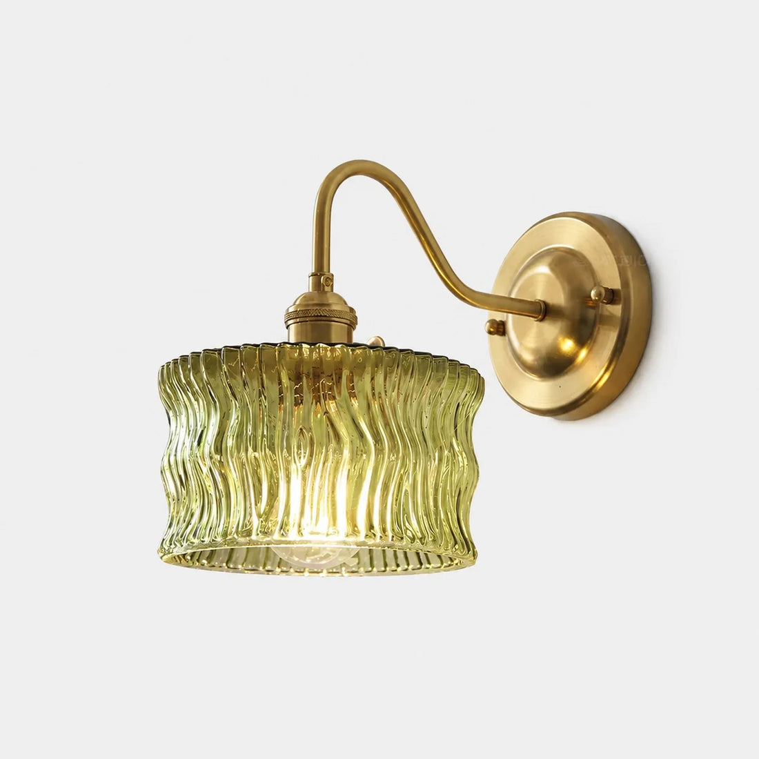 Olive green ripple glass wall sconce with brushed brass arm