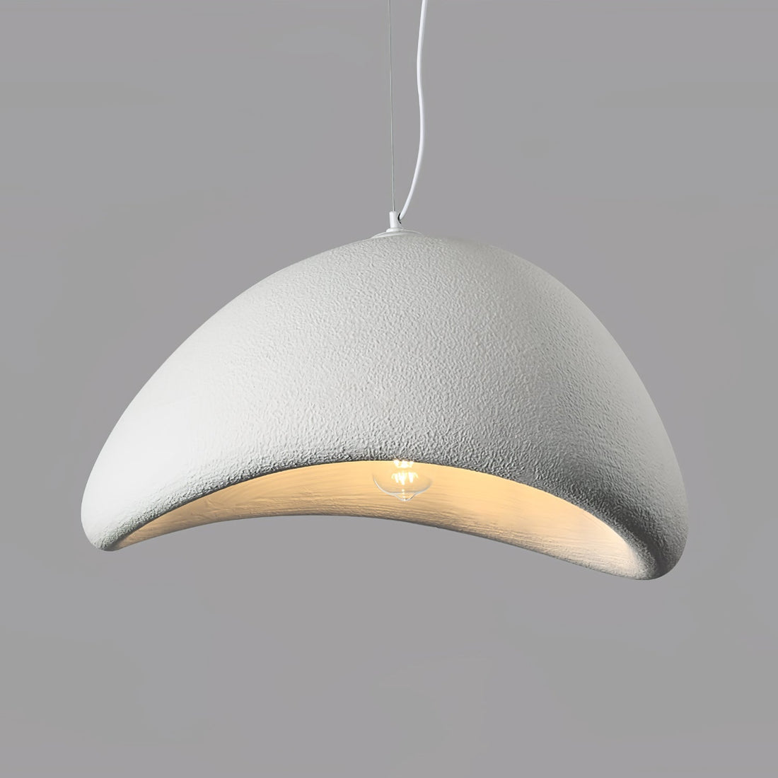 Gebogene Pendelleuchte aus Polystyrol mit Stecker