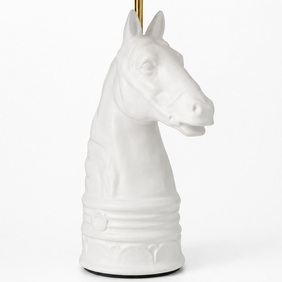 Close detail of white horse head table lamp base
