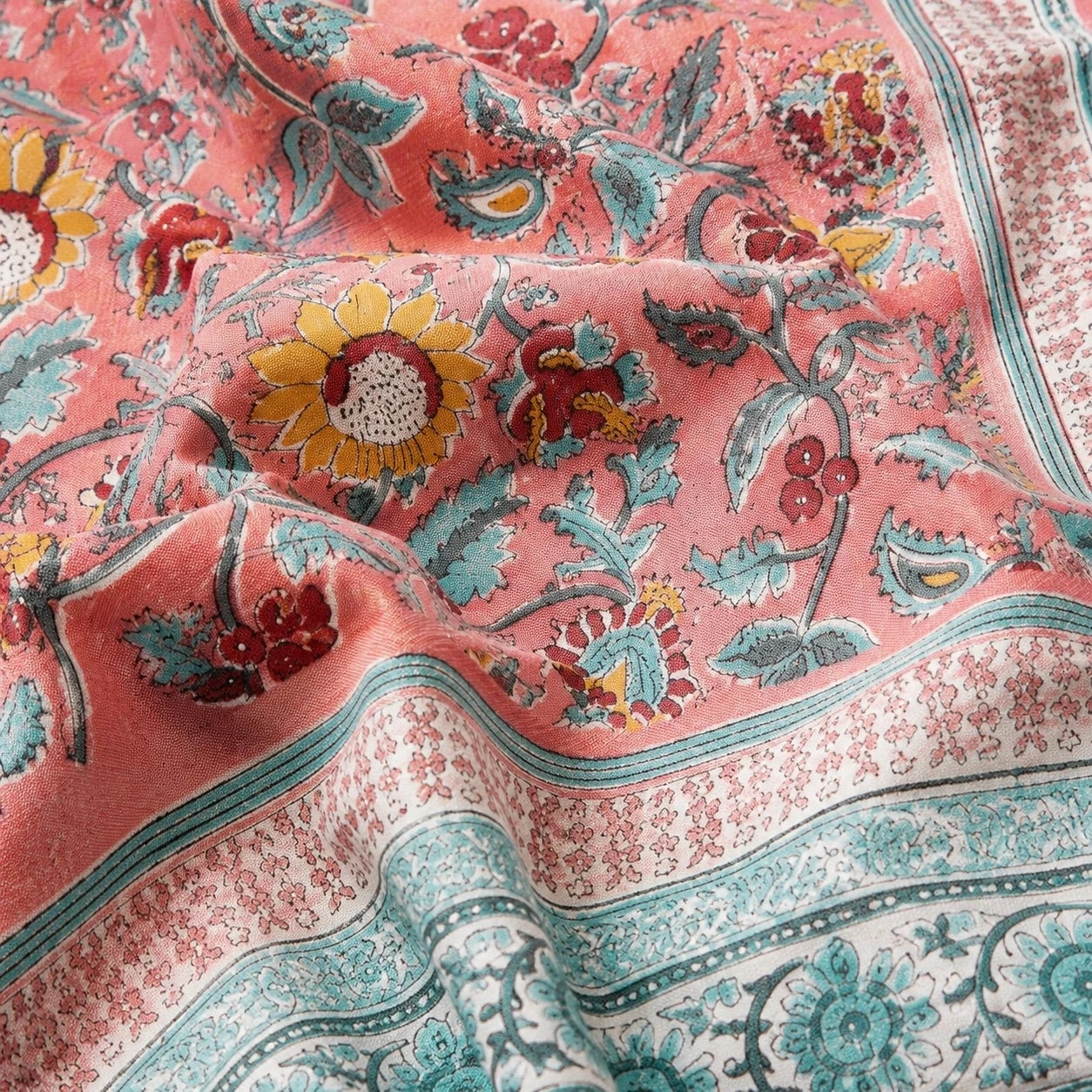 Close detail of pink garden floral border and fabric texture
