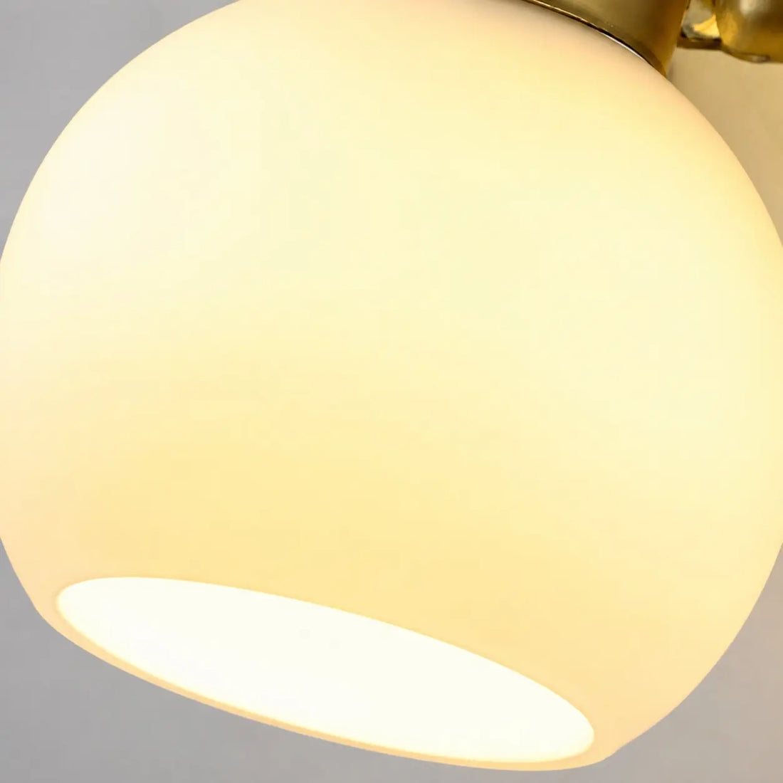 Close-up of the frosted glass shade and open rim