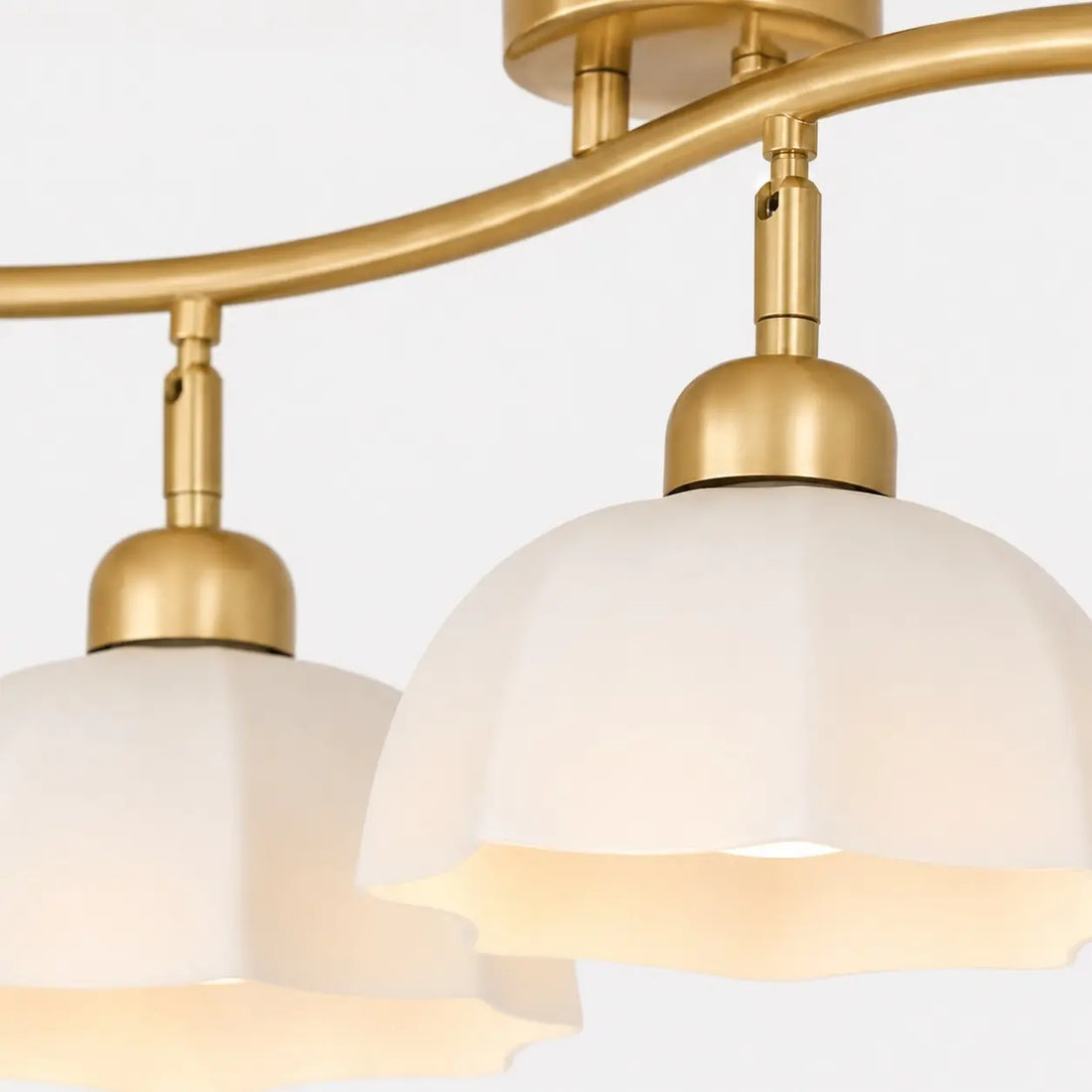 Gold lamp holder and glass shade detail