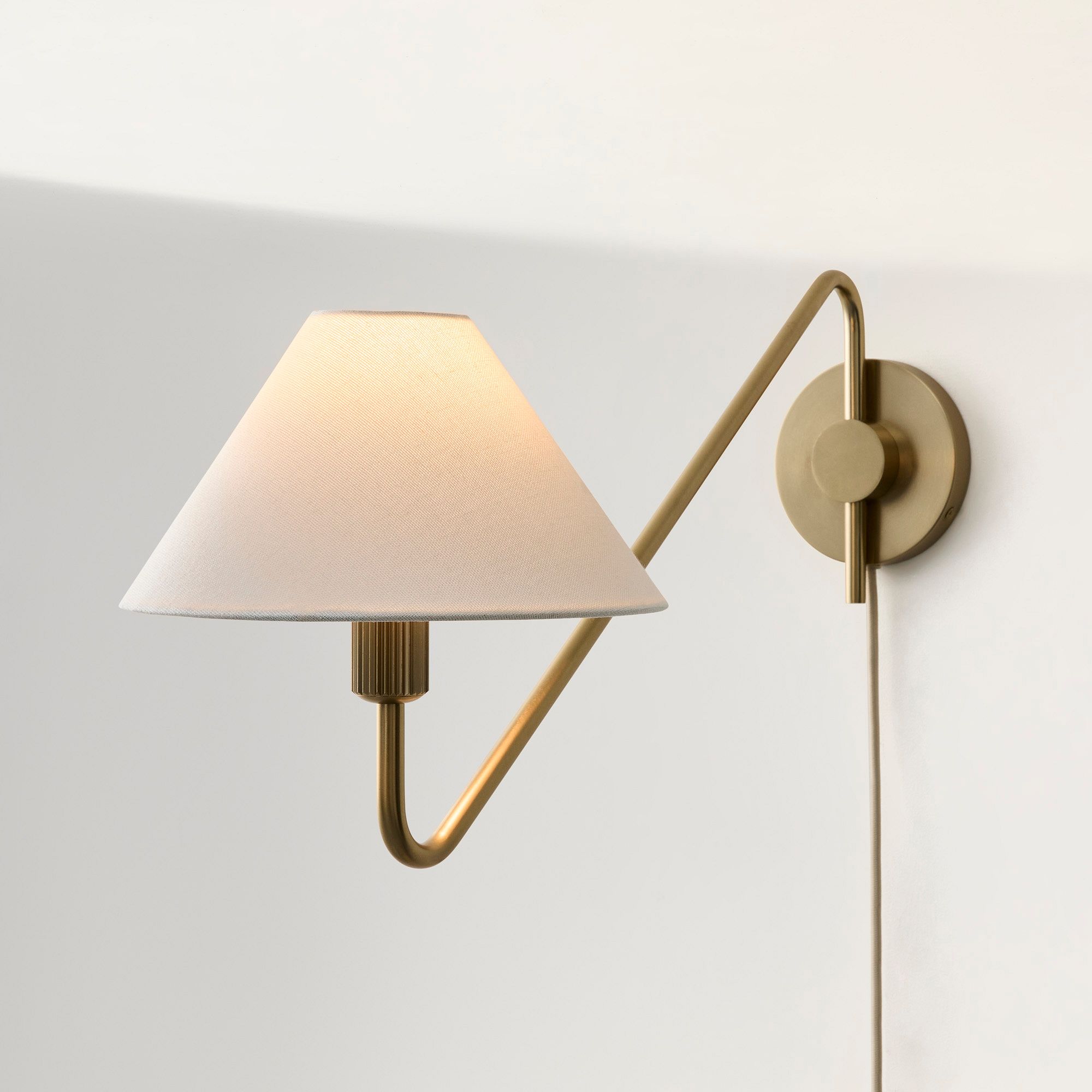 Diora Plug-In Wall Sconce - Champagne Bronze Adjustable Arm Lamp with Linen Shade