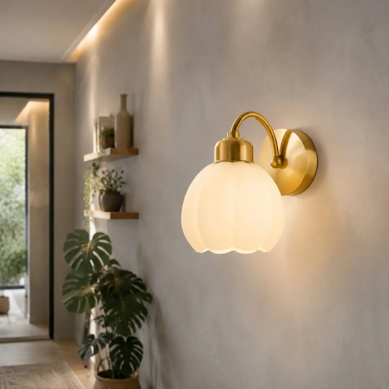 Milk glass flower wall lamp illuminating a hallway