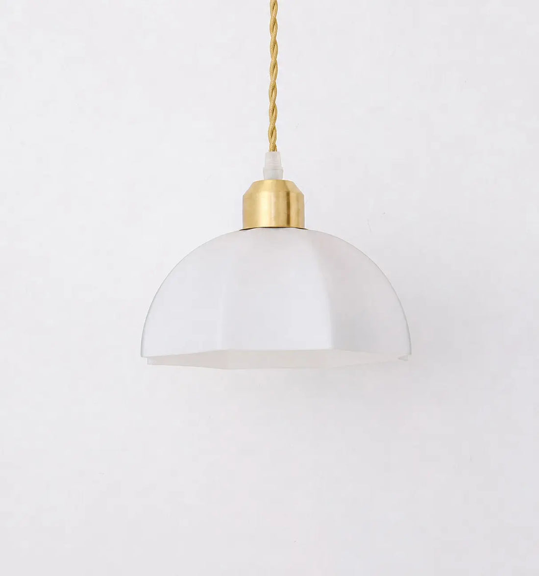 Milk glass pendant light shown unlit
