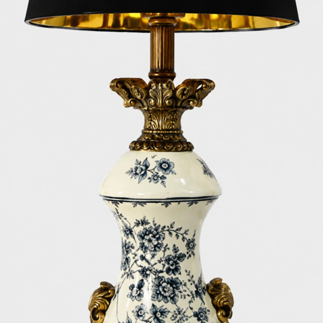 Blue porcelain motif body and carved brass tone detail