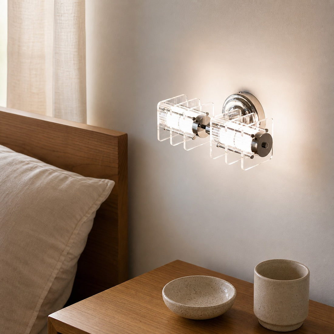 Horizontal Bauhaus acrylic chrome wall lamp in a bedroom wall setting