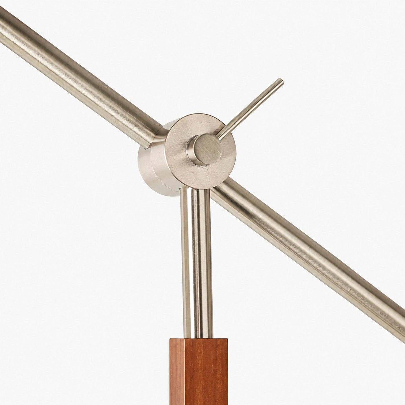 Brushed metal swing arm joint detail