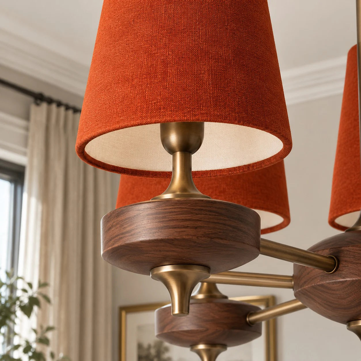 Close-up of the warm red velvet shade and walnut-toned lamp holder