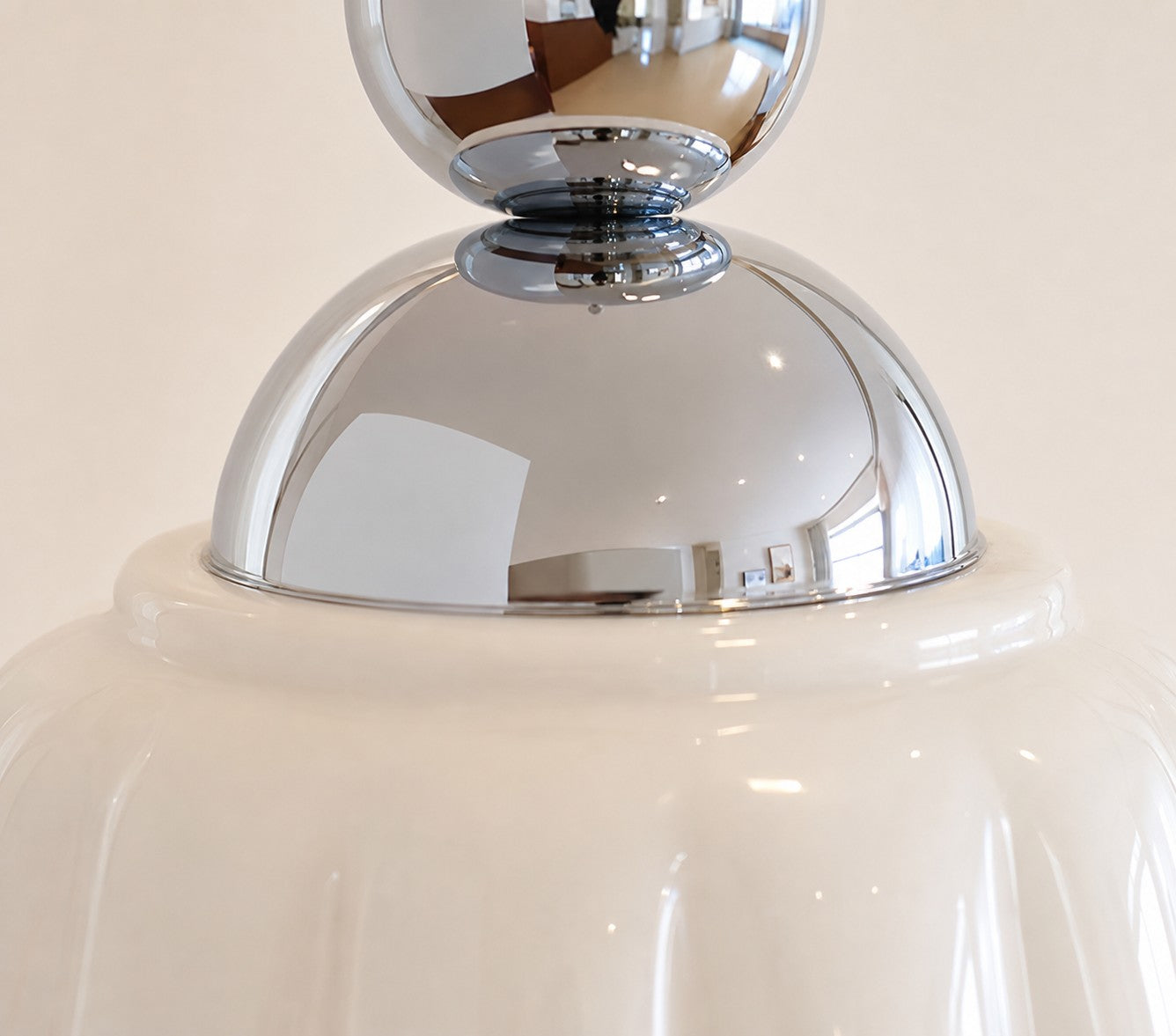 Close view of polished metal pendant hardware