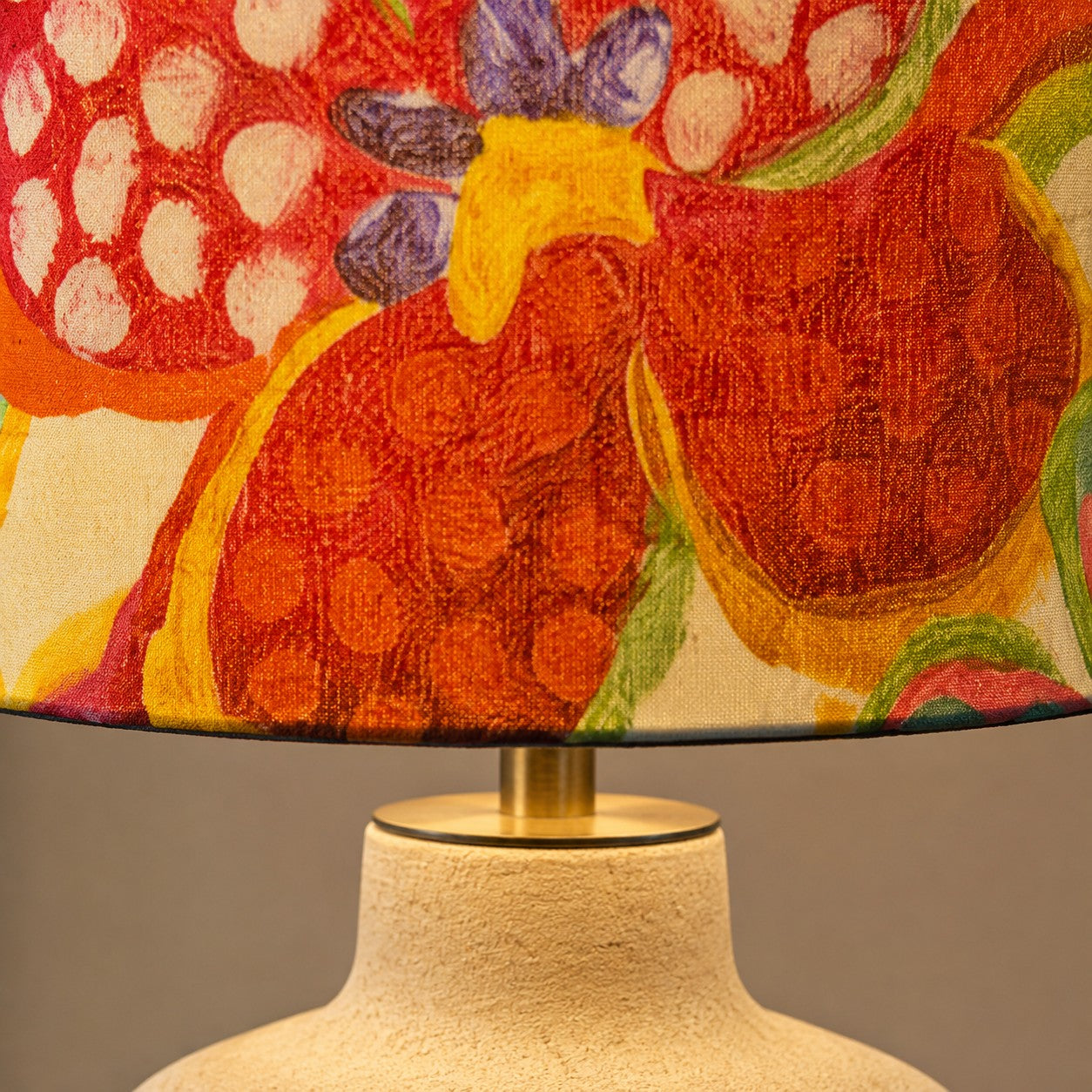 Close-up of the floral shade and ceramic lamp neck