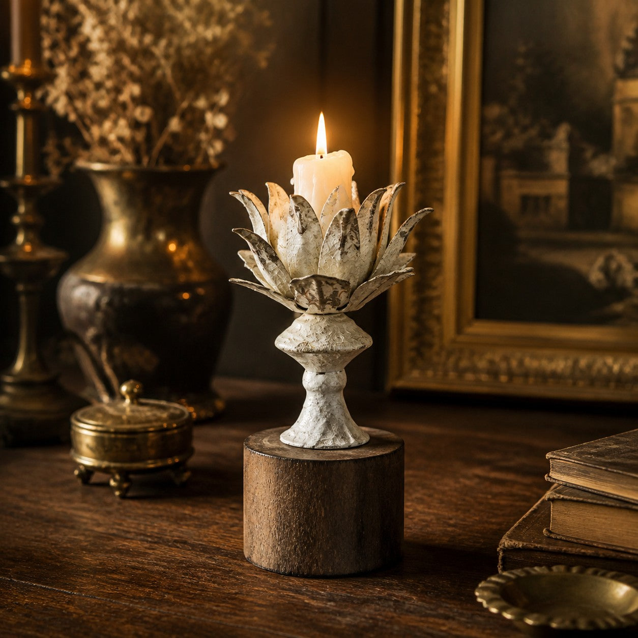 Tall lotus bloom candle holder styled with candlelight