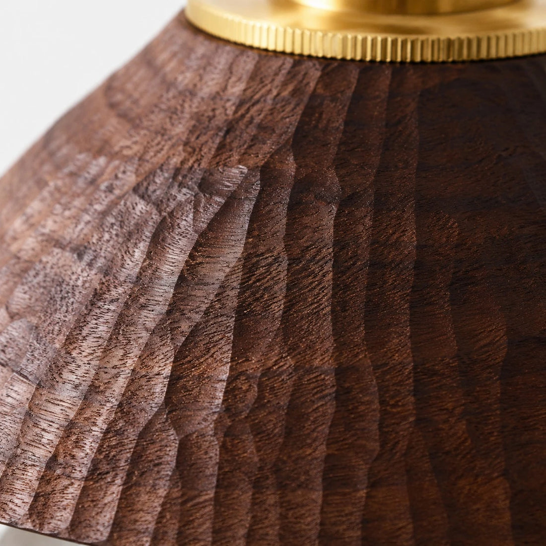 Close view of hand-carved black walnut grain and ridges