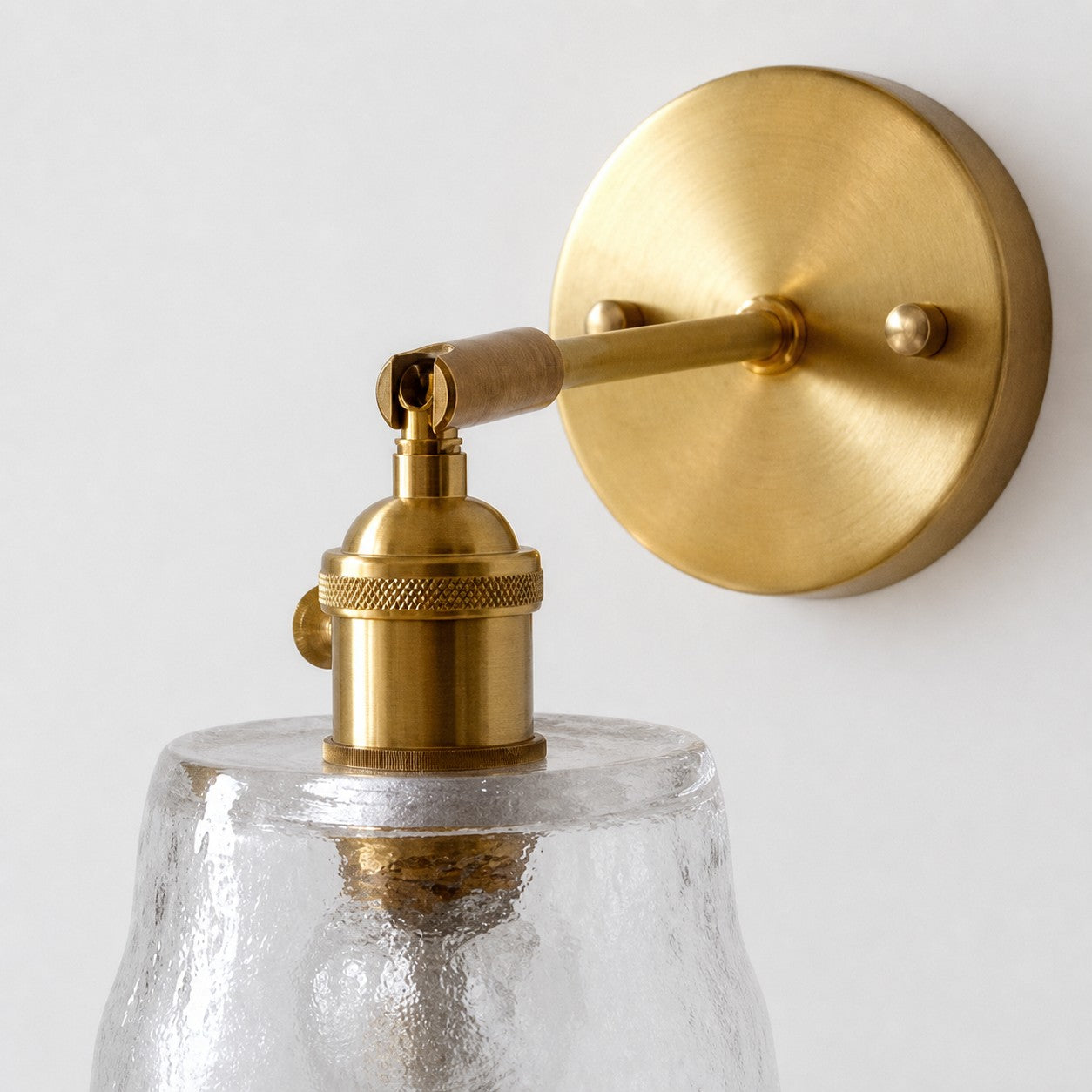 Brass glass wall sconce detail view one