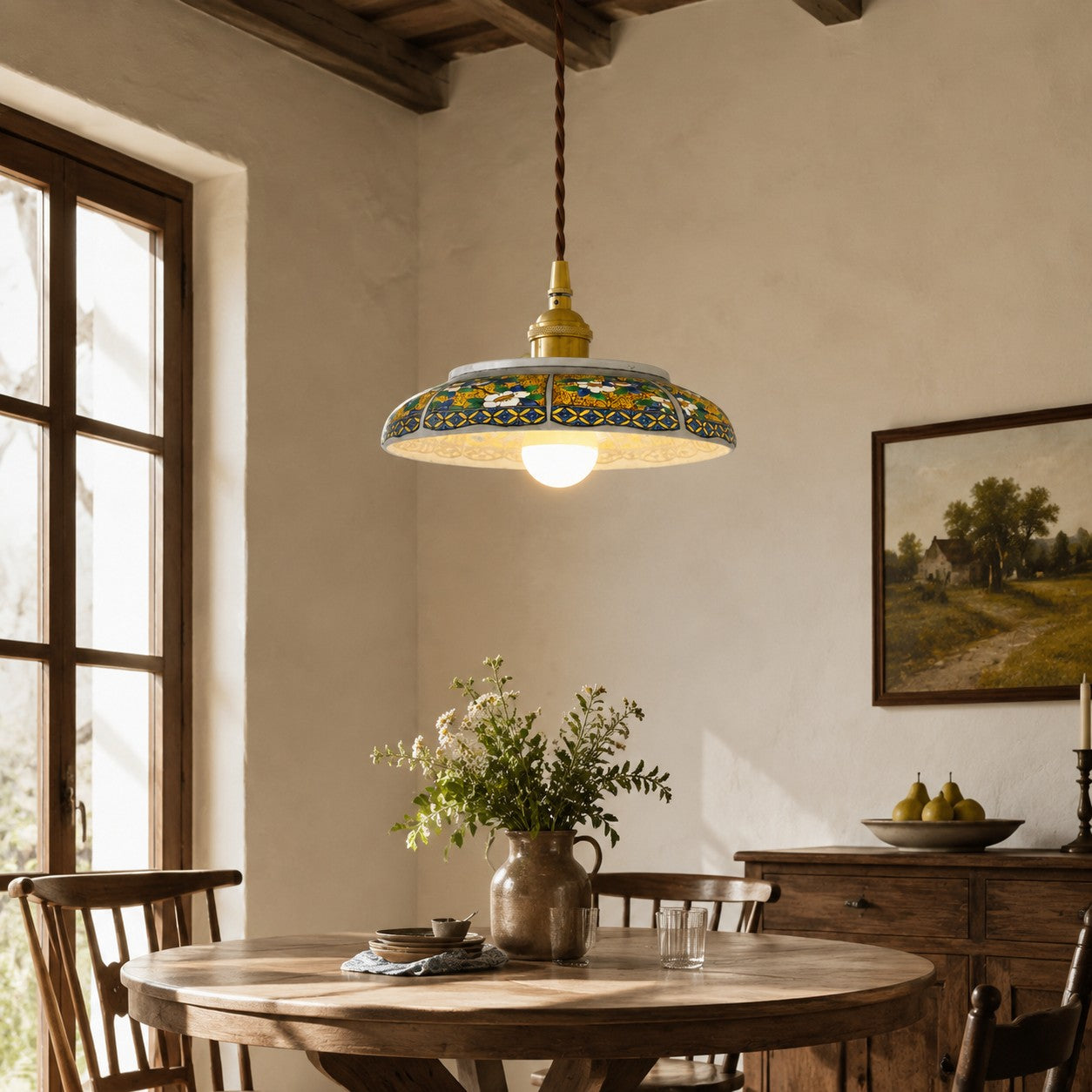 Ceramic pendant lamp installed above a rustic dining table in a warm room