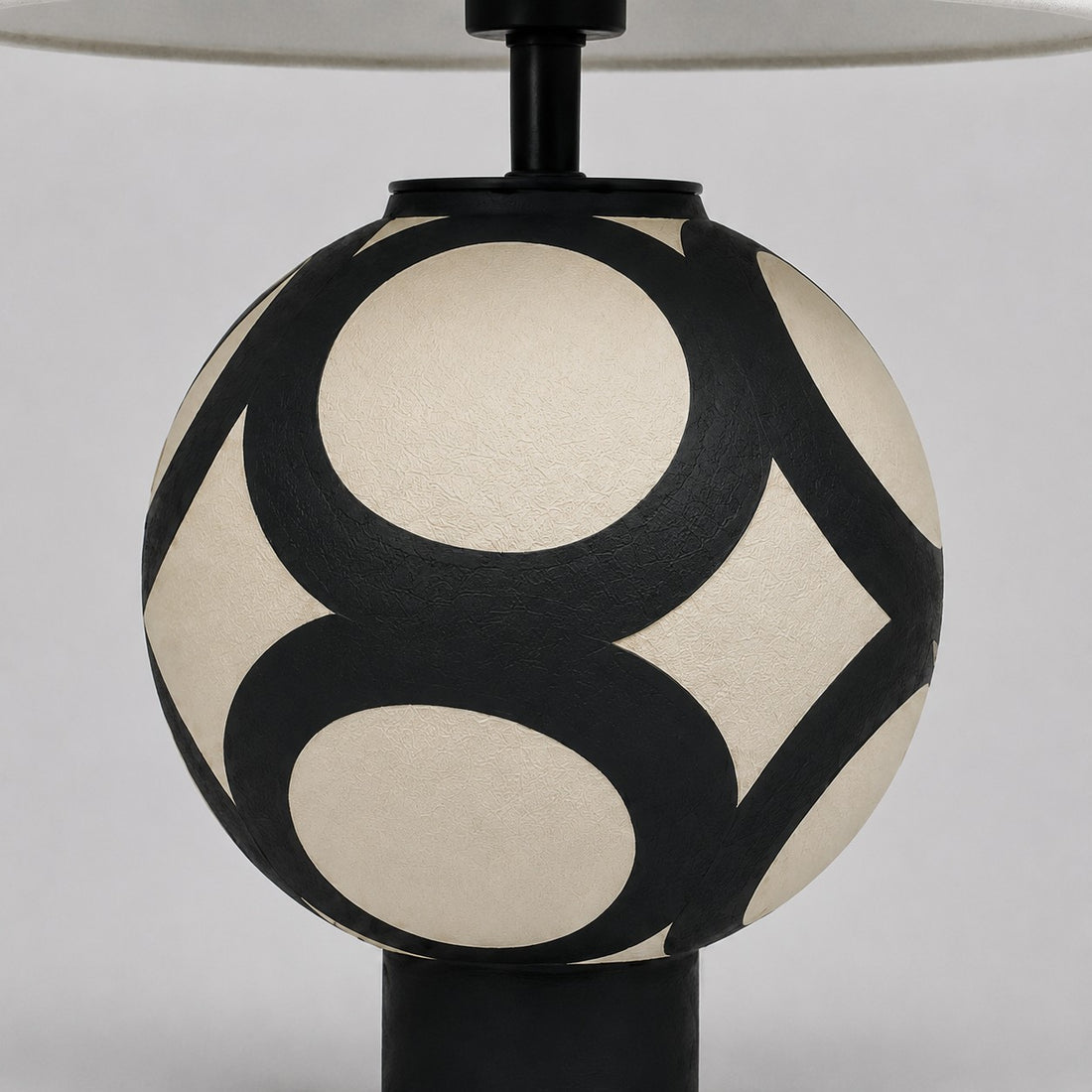 ceramic globe pattern and textured finish detail