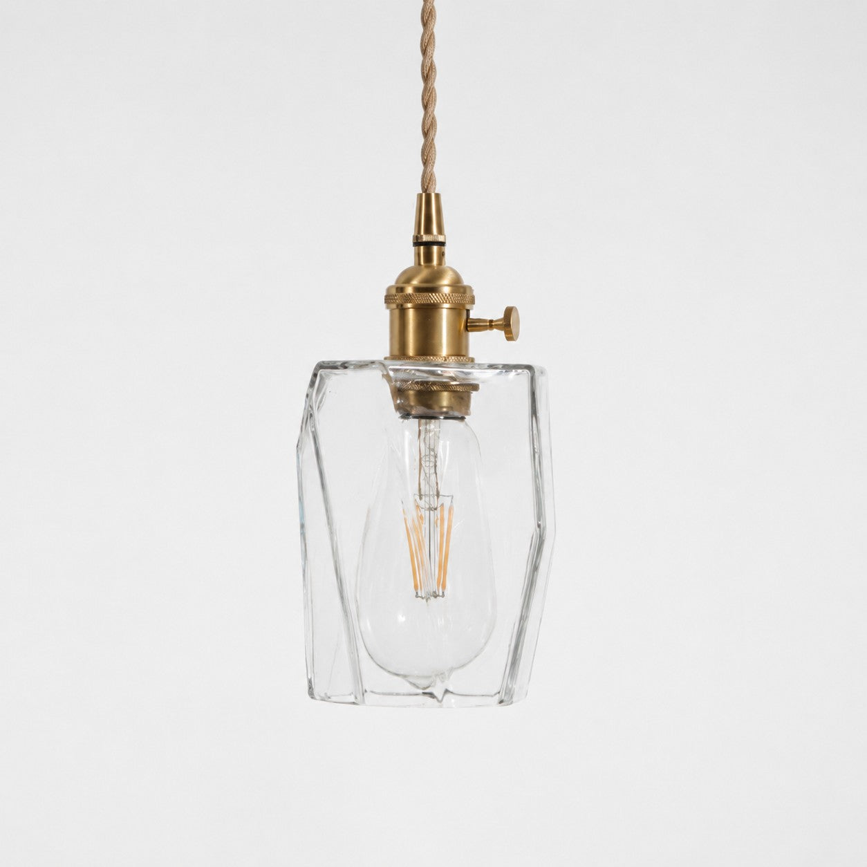 Style X textured glass shade with antique brass E27 socket, front view