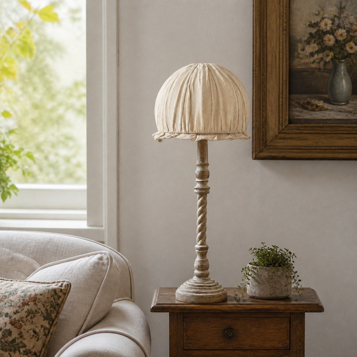 Pleated shade table lamp by window