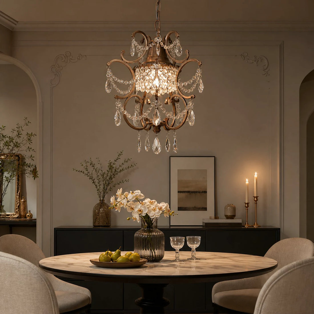 Clear crystal pendant light above a dining table