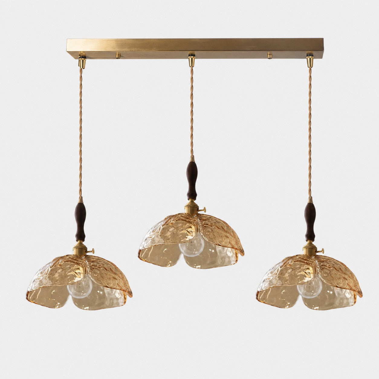 Three-light amber flower pendant with walnut accents