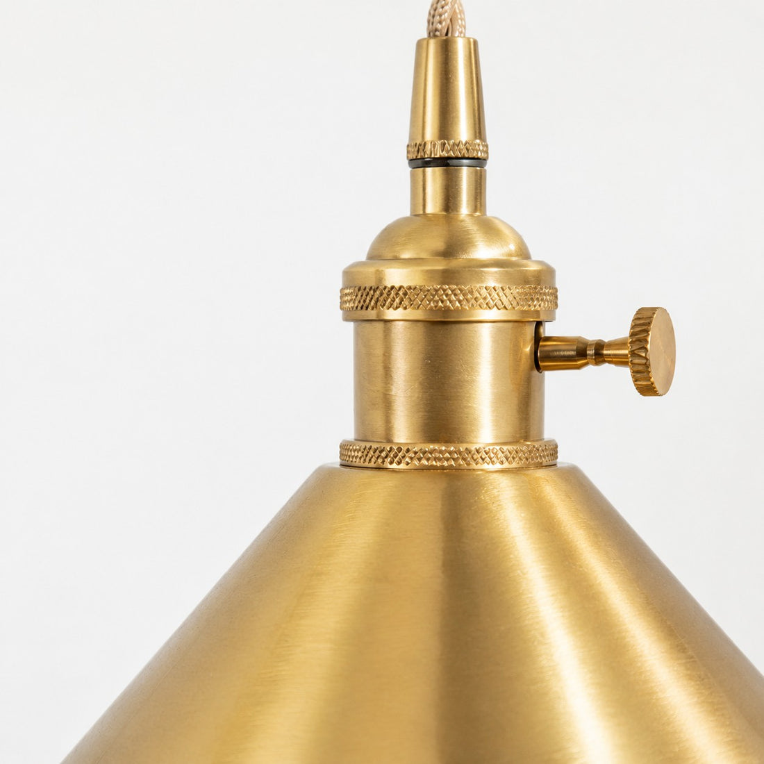 Close view of the knurled copper fitting