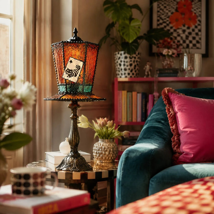 Amber yellow table lamp styled in living room side table scene