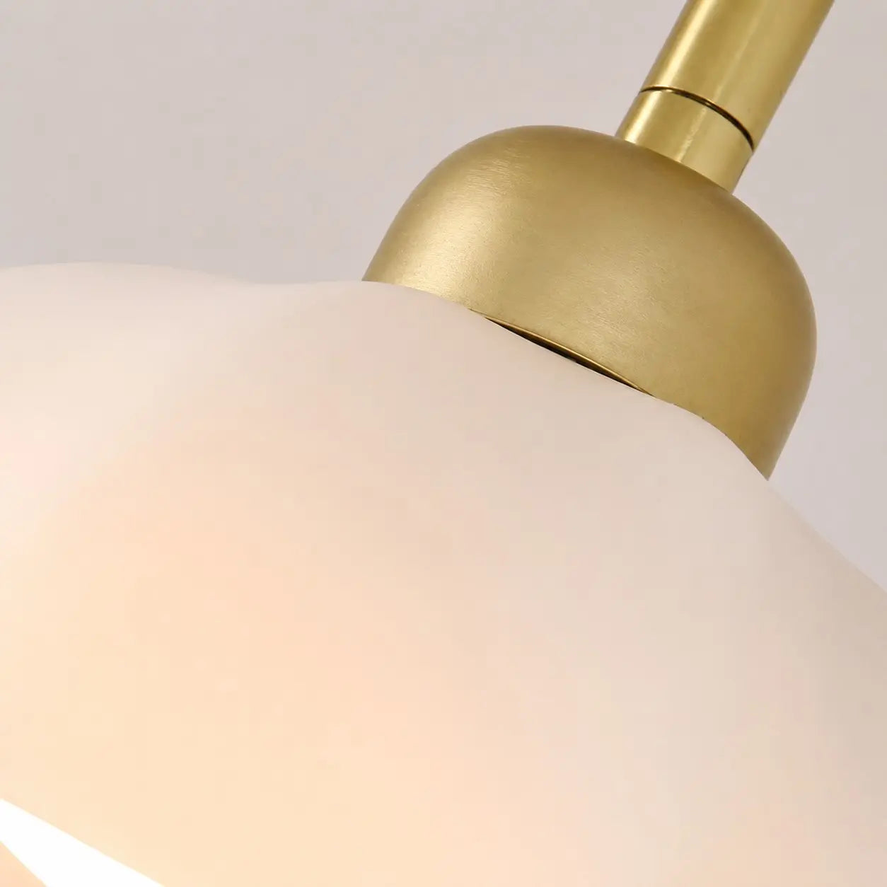 Close-up of the chandelier arm and shade connection