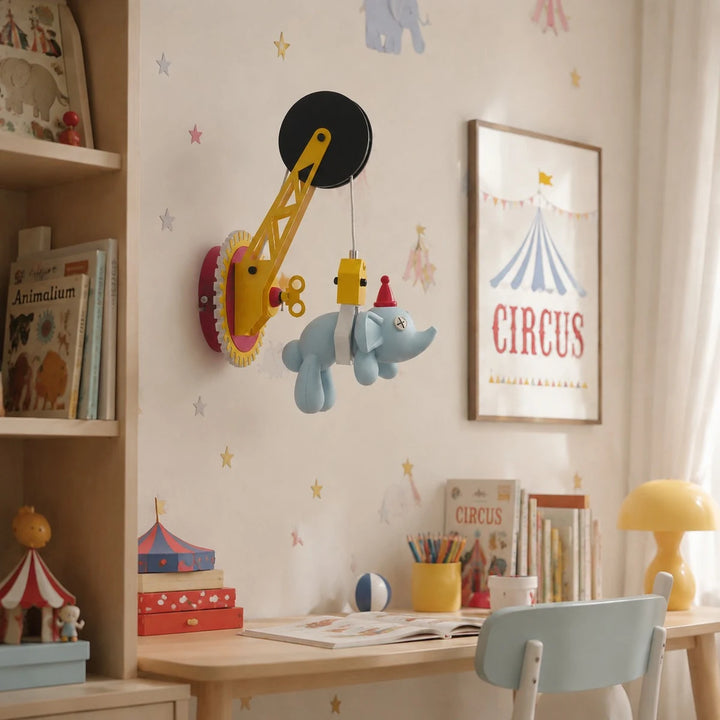 Alice elephant kids wall light installed above a desk