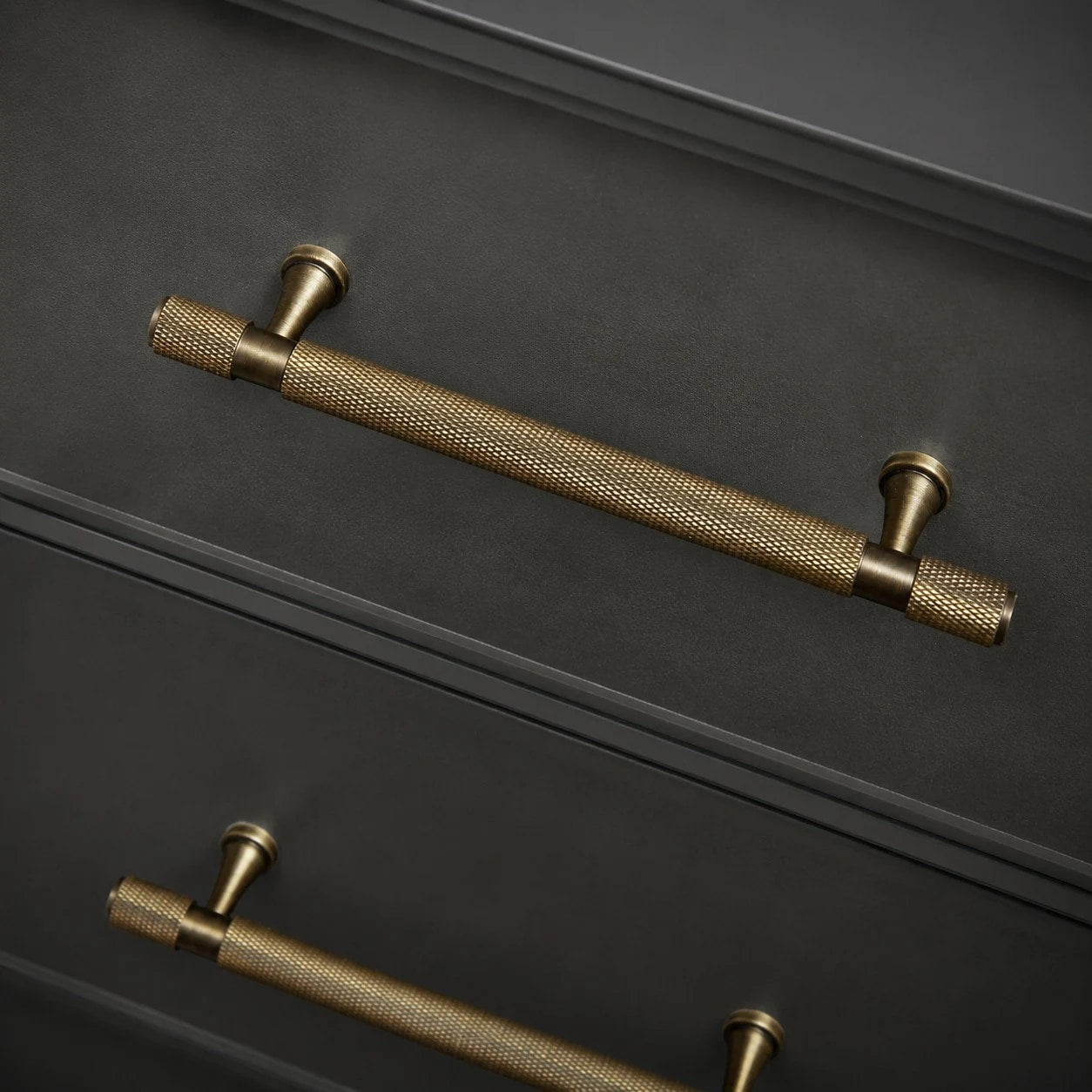 Knurled brass furniture handle closeup