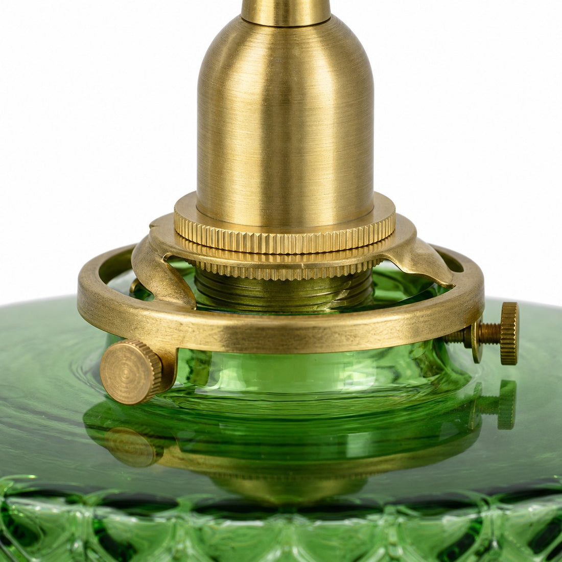 Oxidized brass hardware on emerald green glass