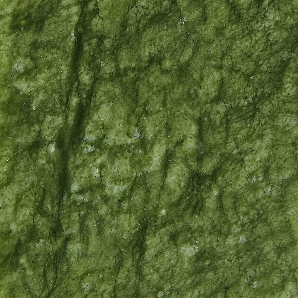 Close-up of natural green jade stone texture