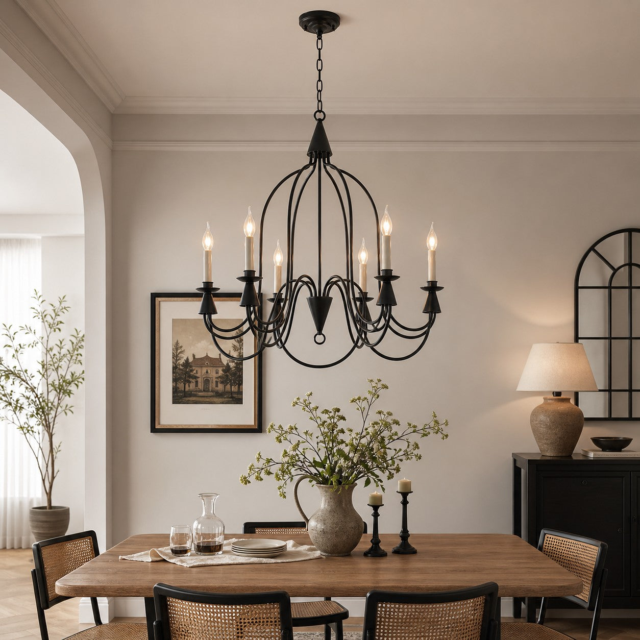 Black six-light candle chandelier in a classic dining room