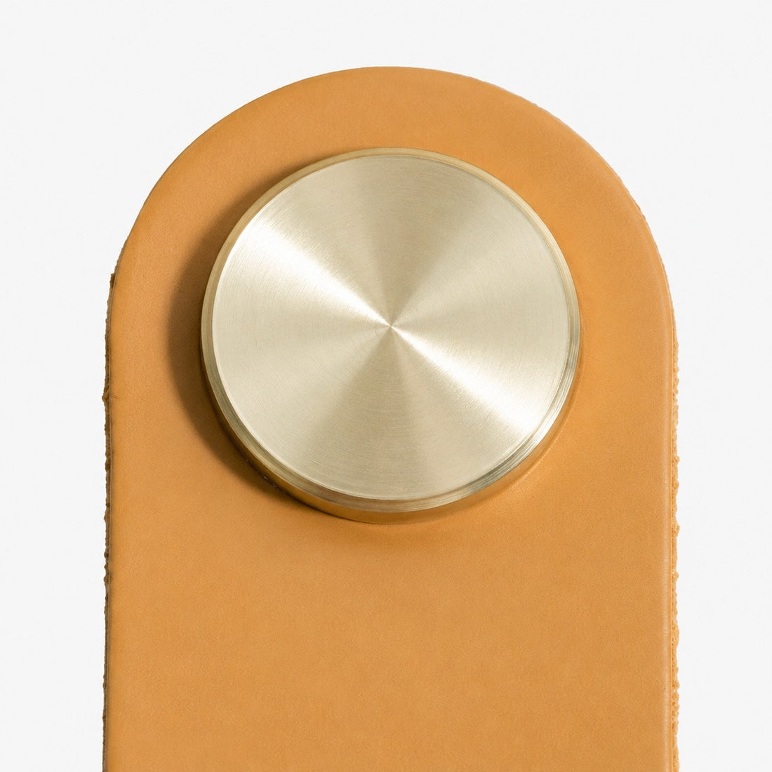 Cowhide leather and brass cabinet pull handle detail and lifestyle image