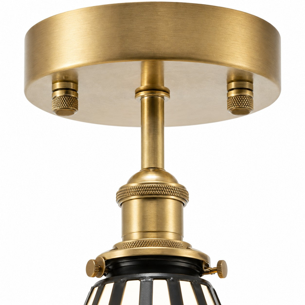 Antique-brass ceiling canopy and lamp holder detail