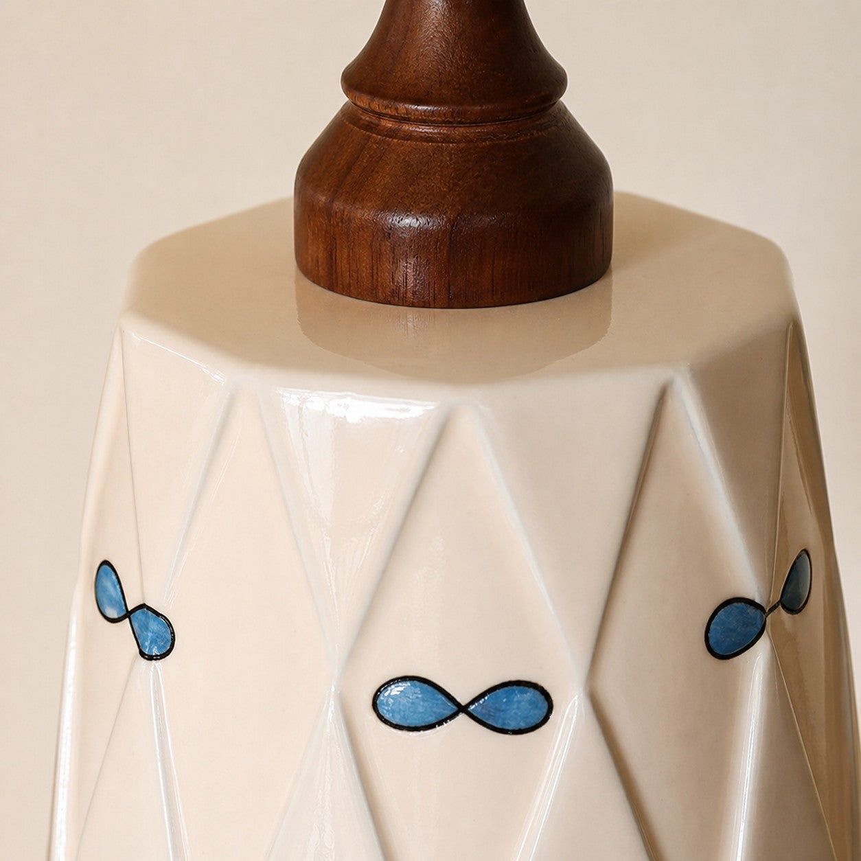 close view of diamond ceramic shade and blue petal detail