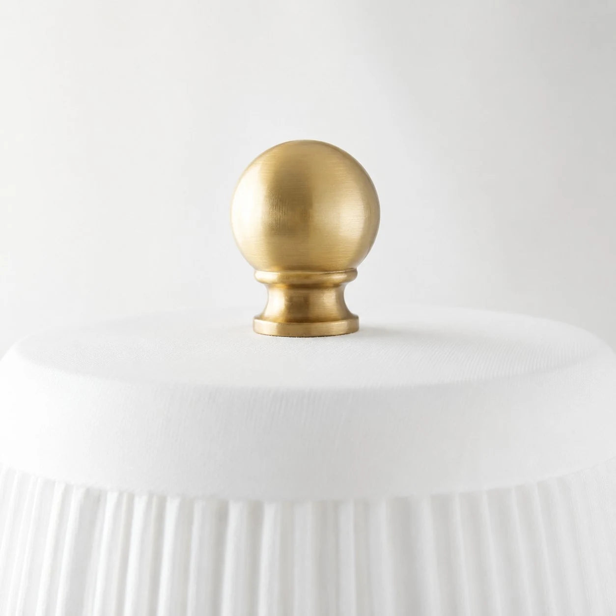 Close-up of the brass finial and shade top